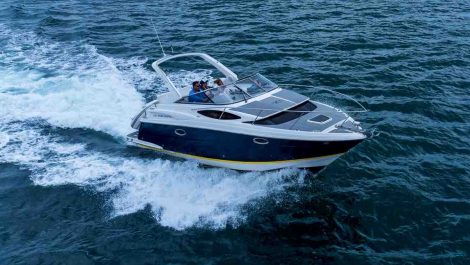 A speed boat zooming on the water