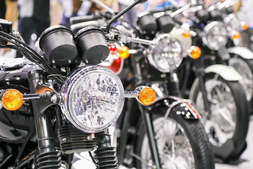 A close up shot of a row of motorcycles