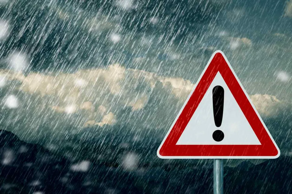 An inclement weather street sign in the hail