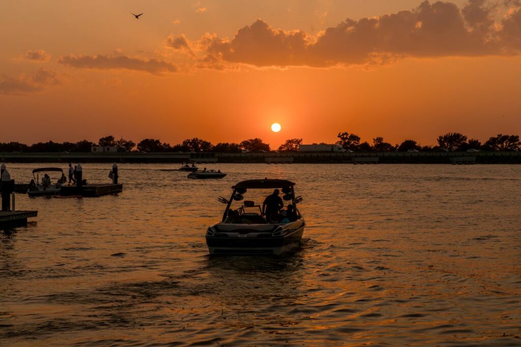 The sun sets as anglers and boaters ride Texas’ Rockwall Harbor.