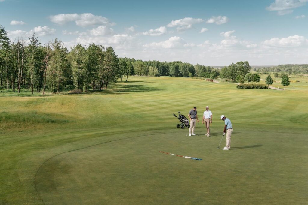 A group of men play golf at TPC Sawgrass in Florida.